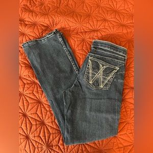 A Baby Wrangler Riding Jeans